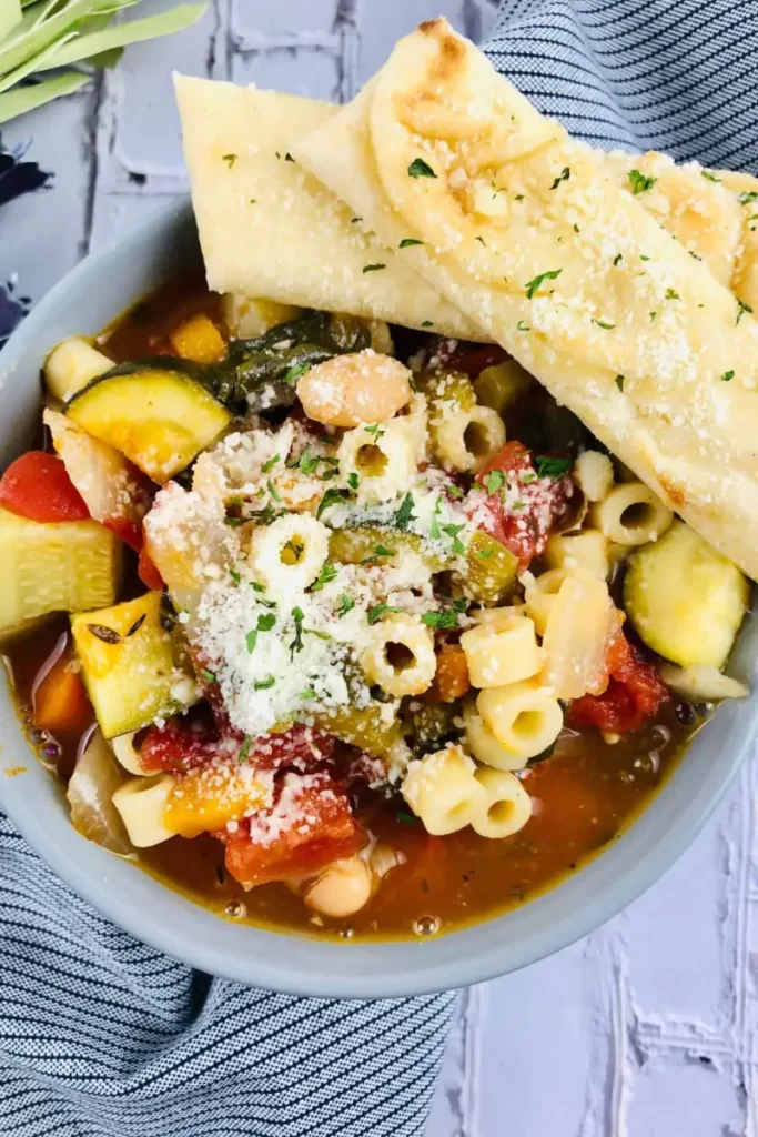 Crockpot Minestrone Soup served in a green bowl