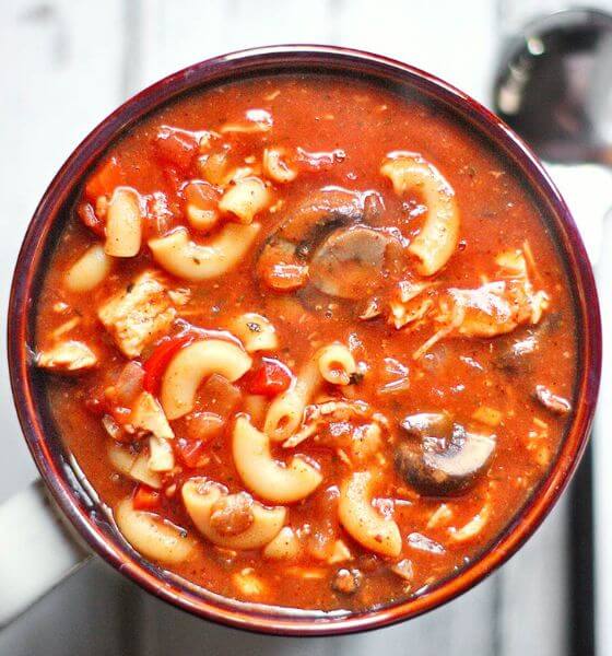 crockpot chicken and chili soup in brown bowl