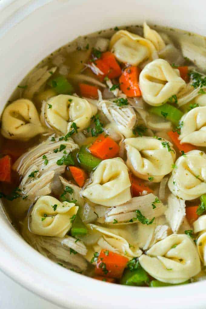 Crockpot Tortellini Soup served in a white bowl