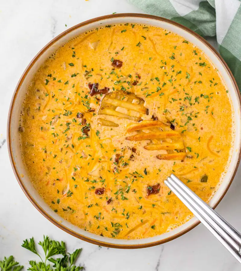 Crockpot Cheeseburger Soup served in a white bowl