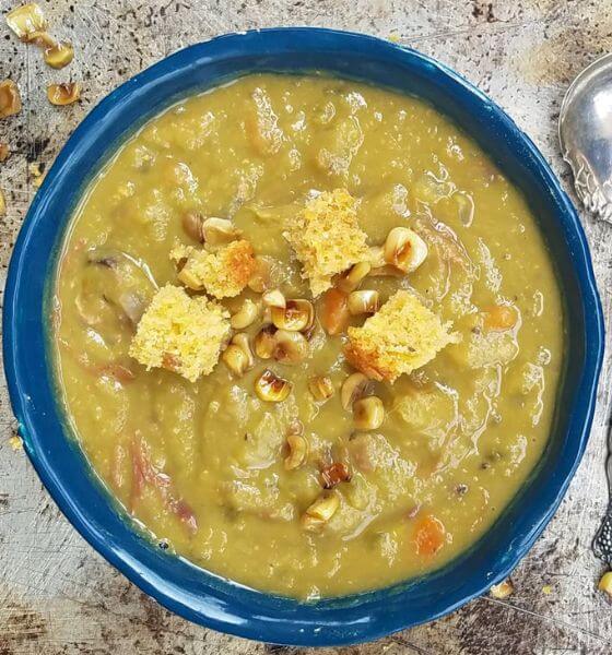 crockpot split pea soup with ham in a blue bowl