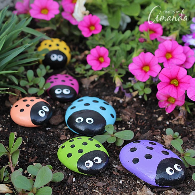 ladybug painted rocks in garden