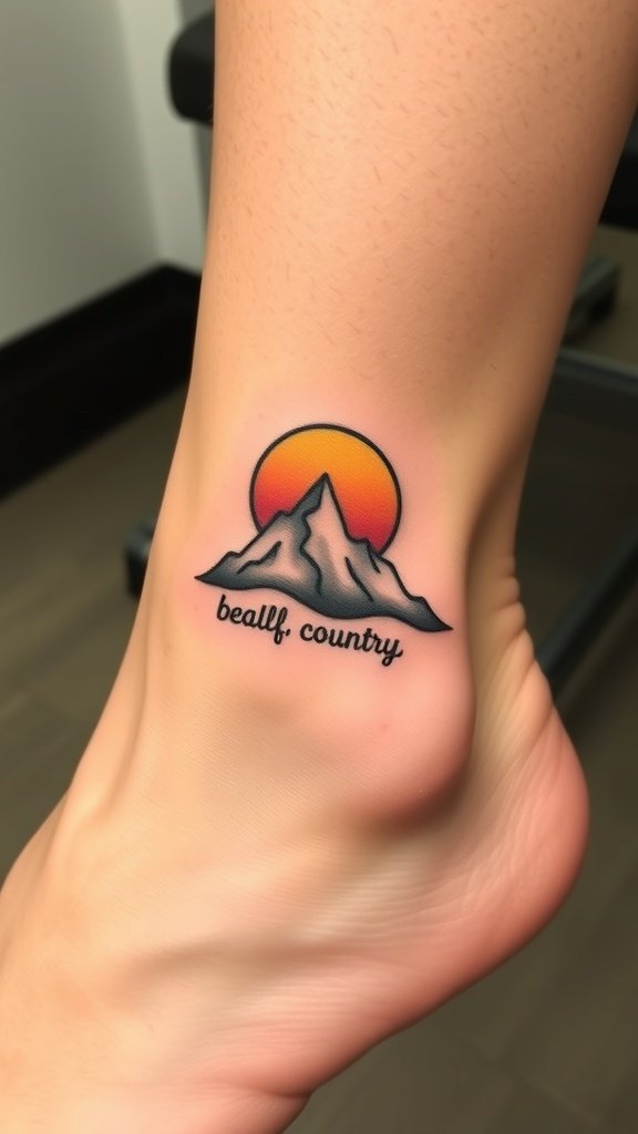 A small mountain tattoo with a sun, located on the ankle.
