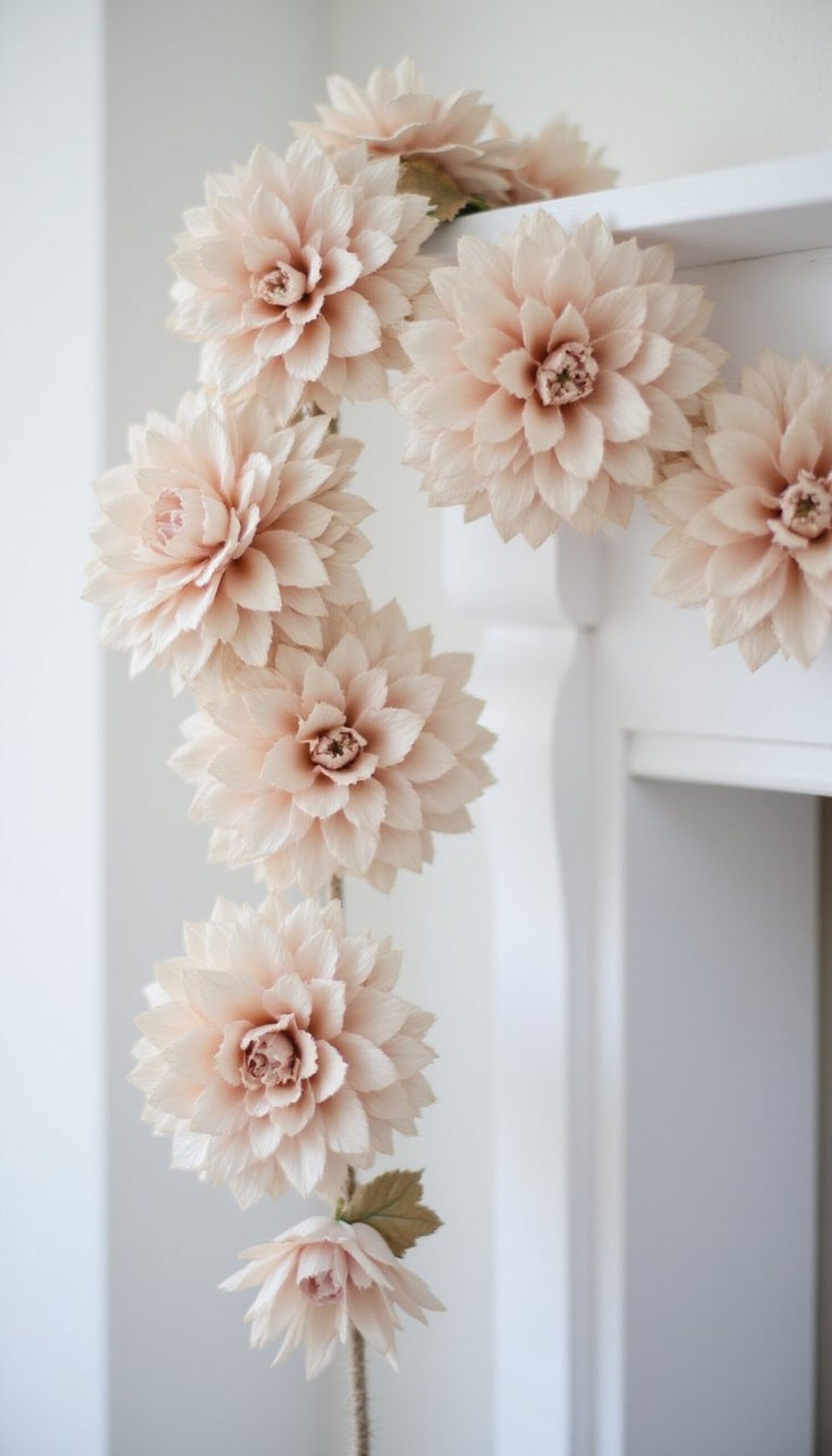 Paper flower garland across the mantel