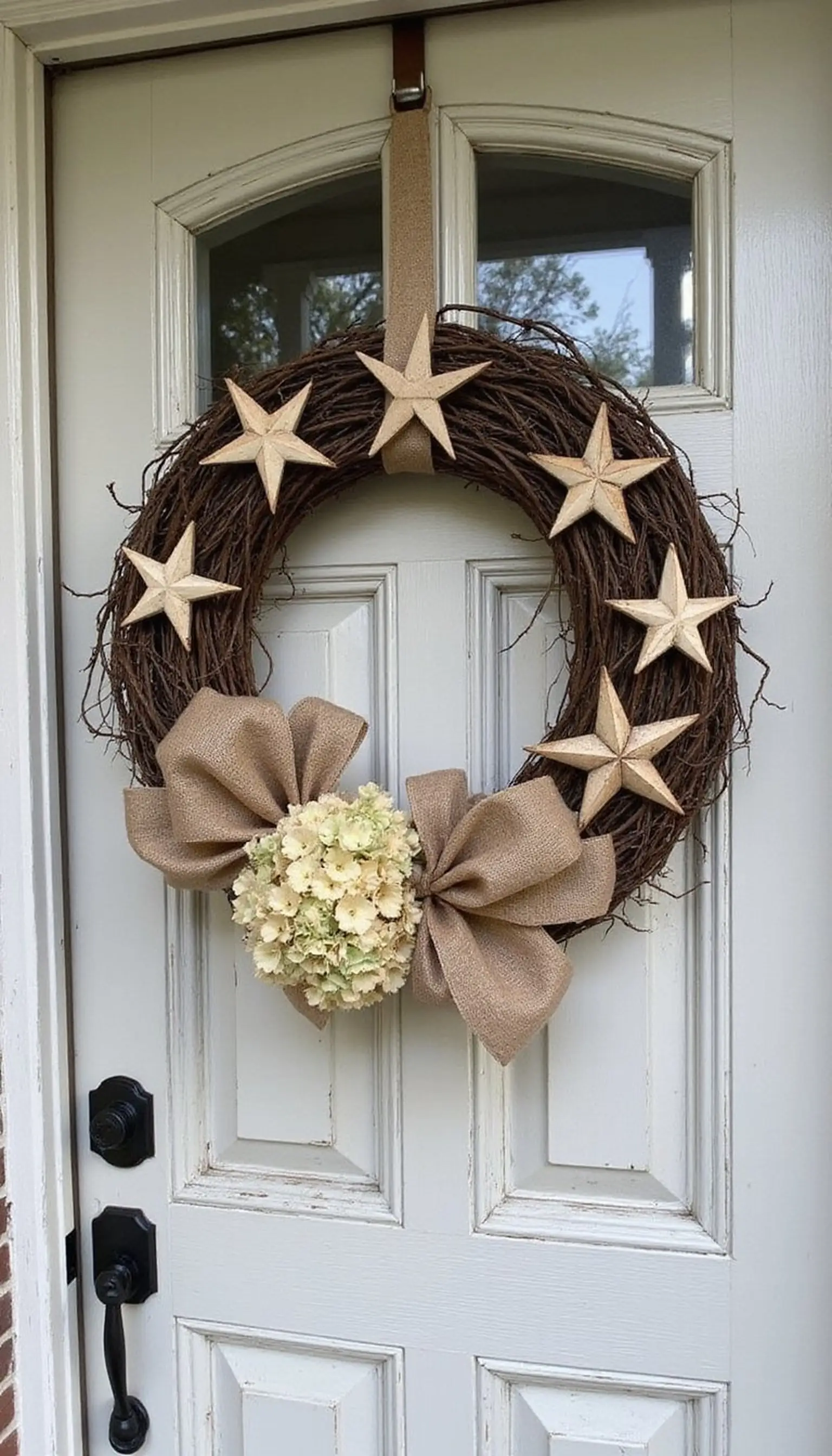 Star-spangled wreath on a rustic front door