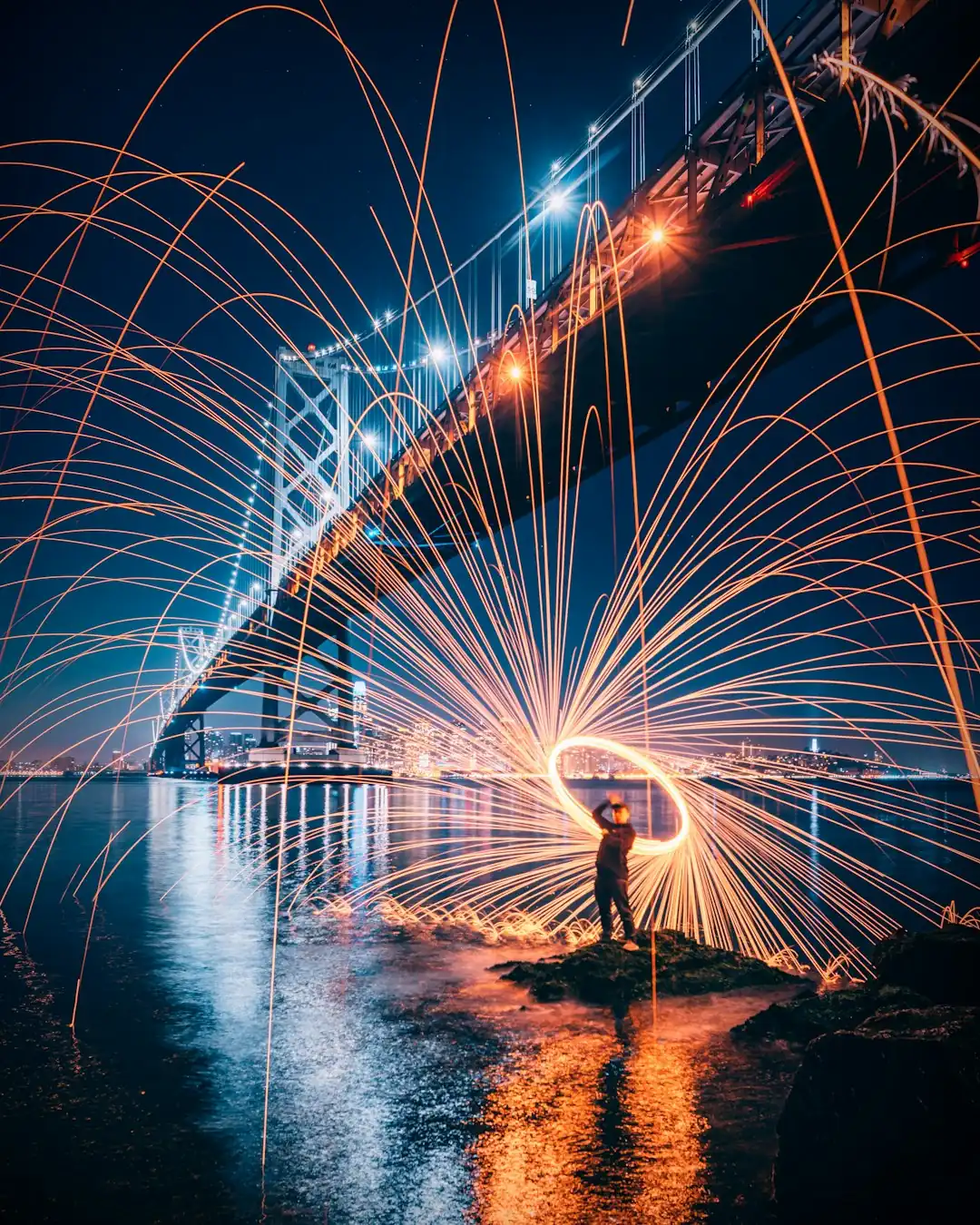 July 4 fireworks over San Francisco Bay and bridge
