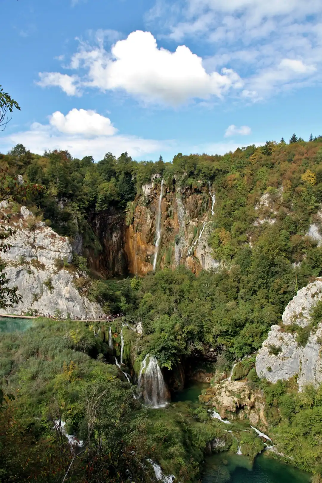Plitvice Lakes: waterfalls and shaded late-summer paths