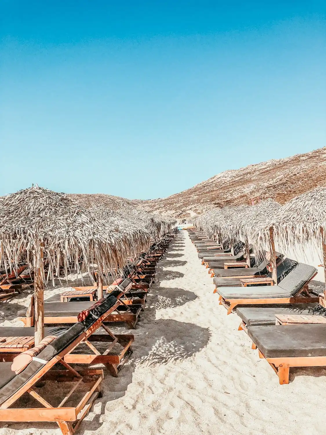 Perissa Beach, Santorini — black sand coastline and bars