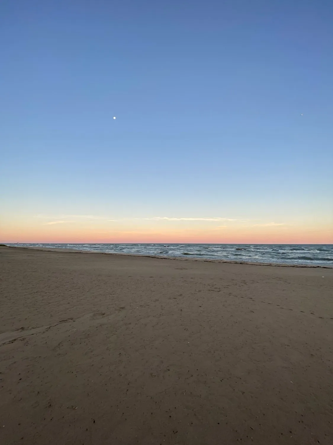 Matira Beach sunsets and shallow lagoon swims