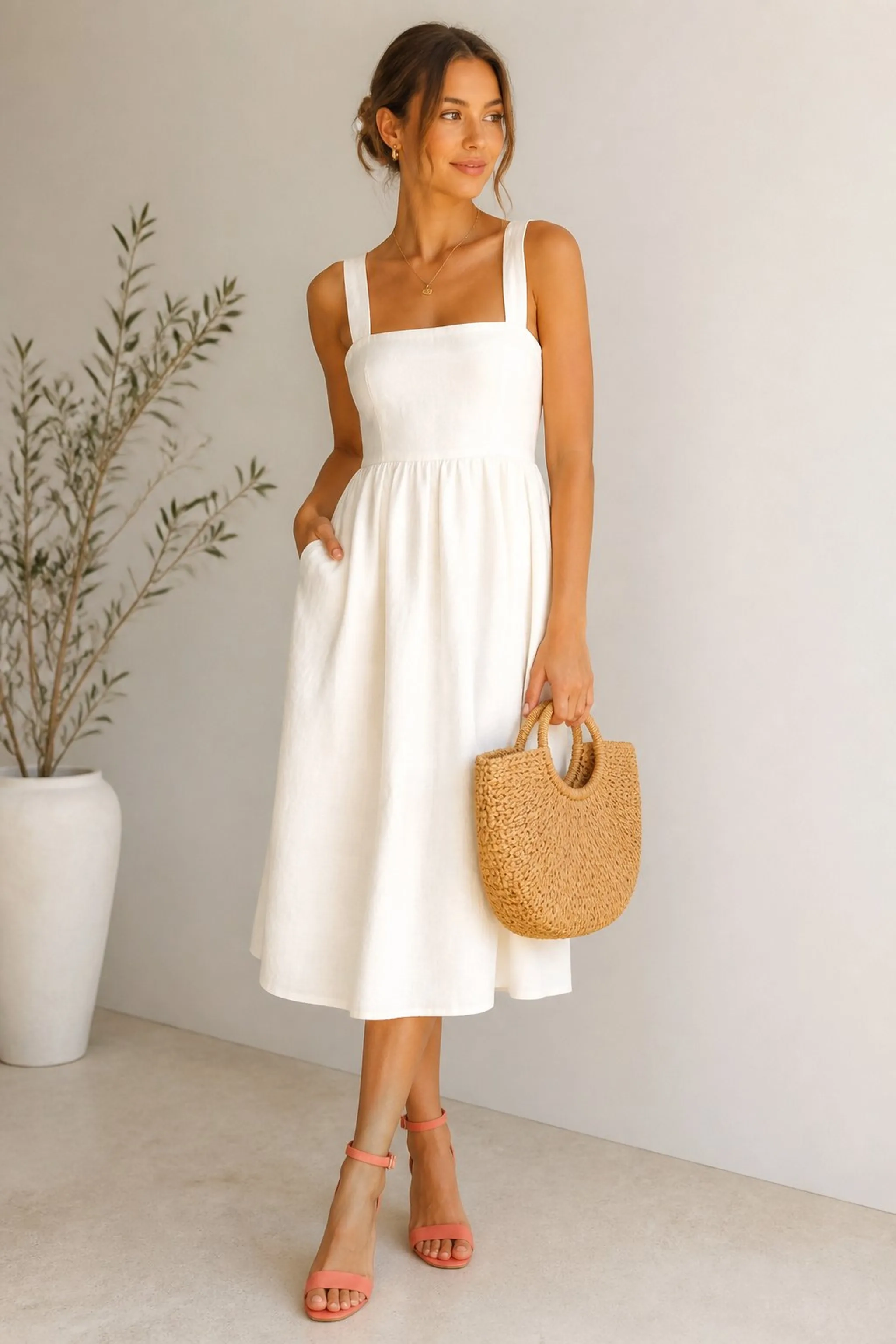 Pale coral ankle strap sandals with ivory sundress