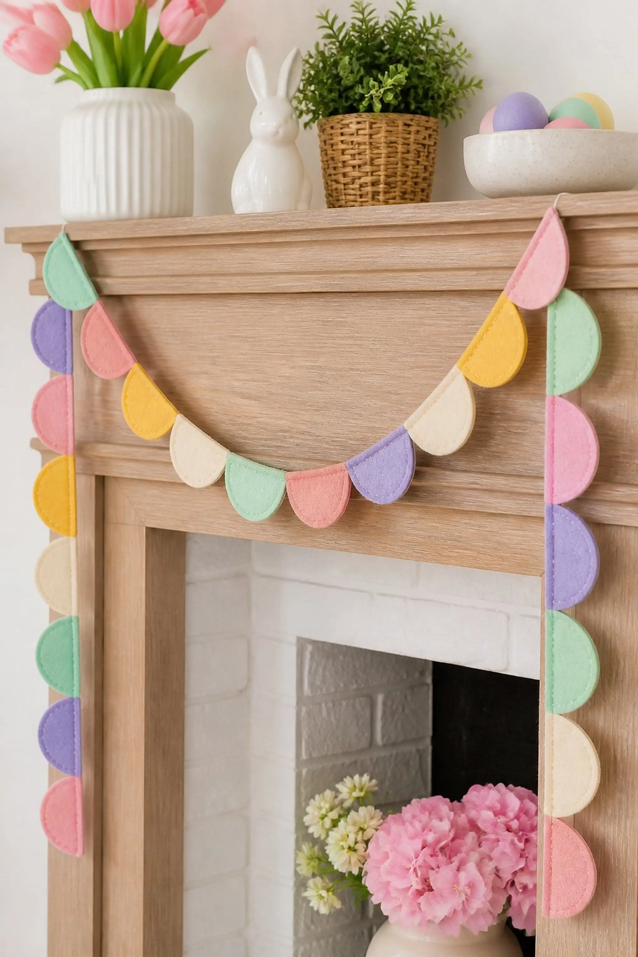 Charming scalloped felt strips create soft festoon