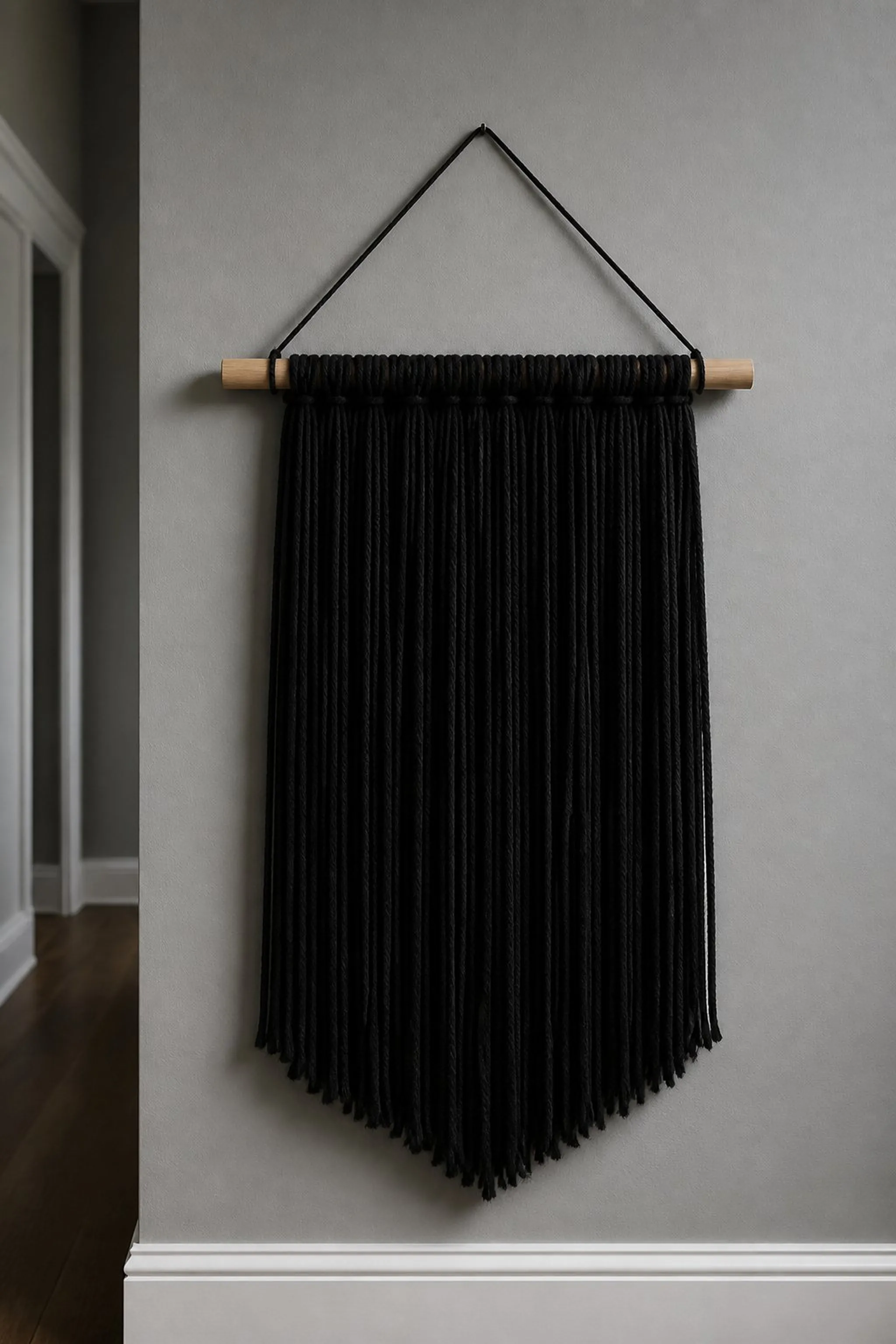 Monochrome black wool yarn wall fringe